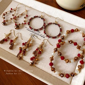 Dân tộc gió tròn giọt nước rỗng móc tai retro cao cấp cảm giác tua rua bông tai Thời trang ánh sáng sang trọng xu hướng bông tai bán buôn