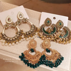 Bộ kim thép kim cương thả hoa ngọc trai bông tai gió quốc gia ánh sáng sang trọng khí chất bông tai đi lại retro bông tai bán buôn nữ