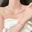 Lắc tay titan nữ không gỉ mạ vàng 18k hình hoa văn cỏ 4 lá phong cách thời trang thanh lịch