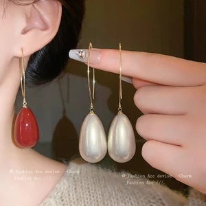 Pháp hình học thả ngọc trai bông tai thời trang retro khí chất móc tai mới cảm giác cao cấp phù hợp với bông tai bán buôn nữ