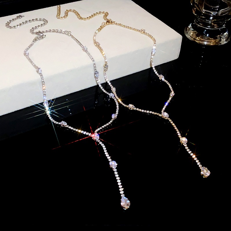 Bộ kim cương giọt nước zircon tua rua vòng cổ Gia vị thời trang lạnh xương đòn dây chuyền thiết kế thích hợp cảm giác trang sức bán buôn nữ