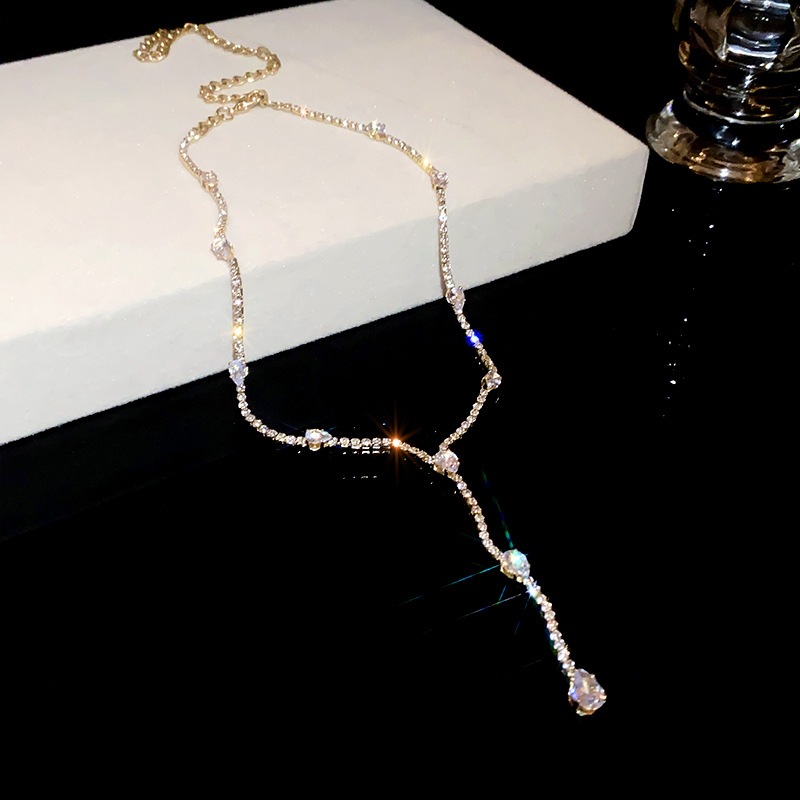 Bộ kim cương giọt nước zircon tua rua vòng cổ Gia vị thời trang lạnh xương đòn dây chuyền thiết kế thích hợp cảm giác trang sức bán buôn nữ