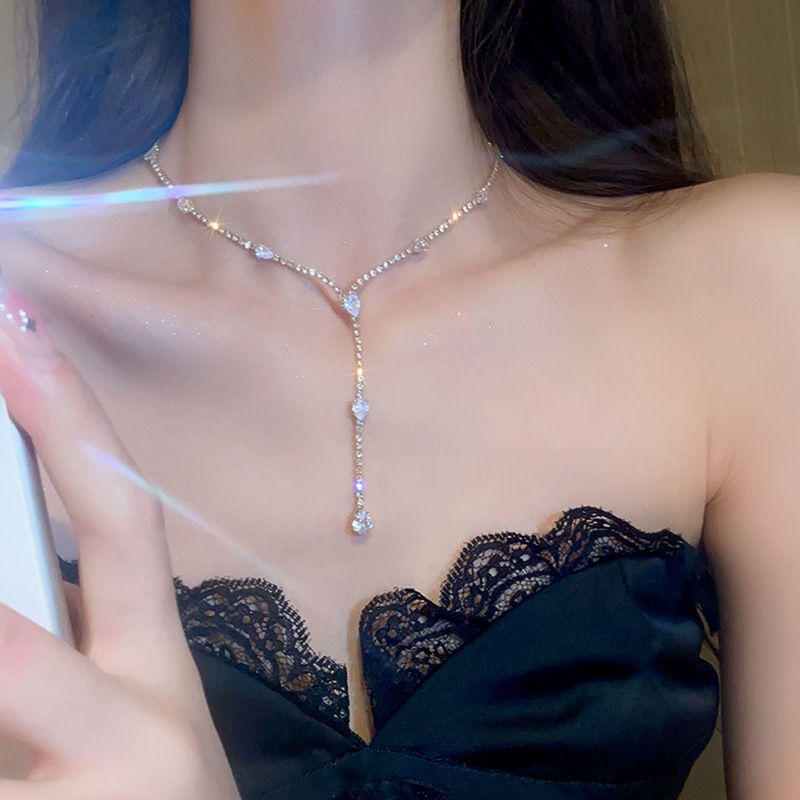Bộ kim cương giọt nước zircon tua rua vòng cổ Gia vị thời trang lạnh xương đòn dây chuyền thiết kế thích hợp cảm giác trang sức bán buôn nữ