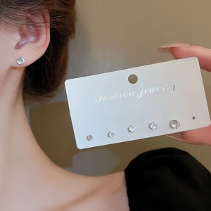 Bông tai zircon tròn kim bạc sáu bộ ánh sáng nhỏ sang trọng đơn giản đinh tán thời trang thiết kế đi lại cảm giác bông tai bán buôn