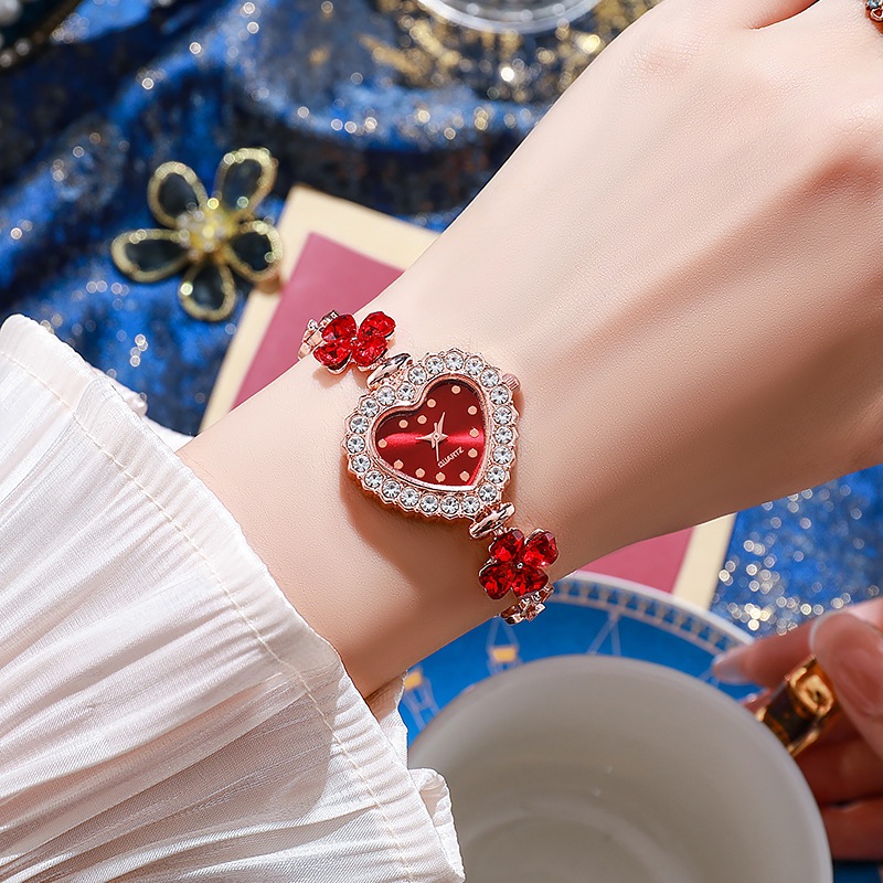 Đồng hồ đeo tay hình trái tim thời trang cỏ bốn lá cỏ ba lá đồng hồ thạch anh nữ có giá trị cao