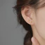 Bông tai nữ bằng titan cao cấp không gỉ mạ vàng 24k hình bông hoa nhỏ xinh xắn dễ thương