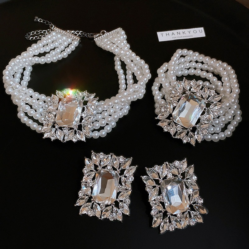 Ánh sáng Pháp sang trọng zircon nhiều lớp vòng cổ ngọc trai bông tai bộ vòng tay thời trang chuỗi xương đòn cao cấp cảm giác thích hợp trang sức