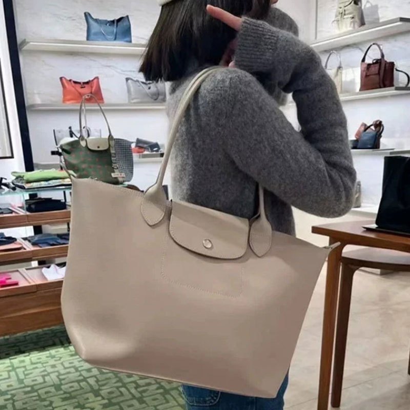 War Horse Mới Nữ Da Bánh Bao Bun Tay Cầm Dài Đơn Vai Túi Xách Tua Rua Túi tote