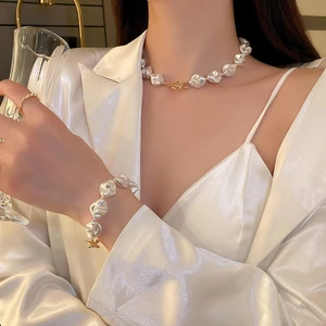 Hàn Quốc Dongdaemun ngọc trai không đều khóa chữ T vòng tay thiết kế cảm giác khí chất dây chuyền xương đòn vòng cổ thời trang dành cho nữ