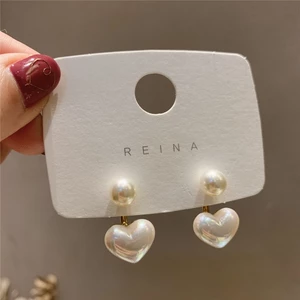 Kim bạc đơn giản bông tai ngọc trai tình yêu nhỏ Hàn Quốc Dongdaemun bông tai cô gái mạng lưới màu đỏ bán buôn khí chất nhẹ bông tai sang trọng
