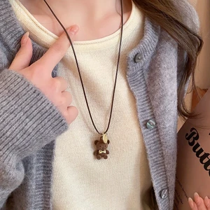 Vòng cổ mặt dây da nơ gấu đổ xô mùa thu đông dễ thương thích hợp dây chuyền áo len khí chất dây chuyền cảm giác cao cấp nữ