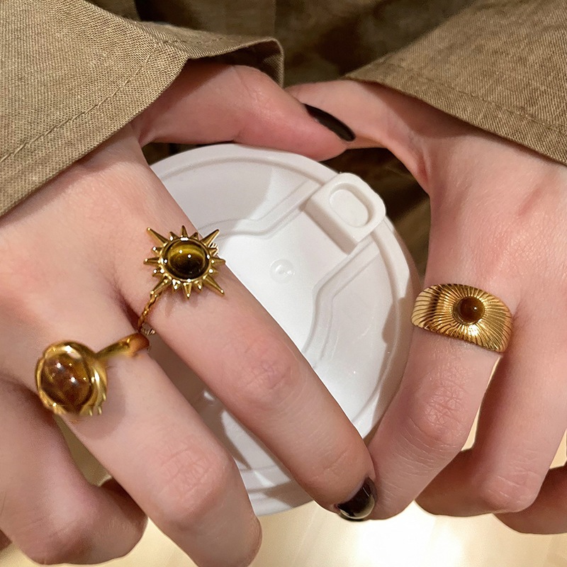[Jewbeauty] Hoa hướng dương hổ nhân tạo Vòng đá mắt cổ điển Maillard khí chất ngón trỏ nhẫn đi lại thiết kế trang sức tay mới bán buôn