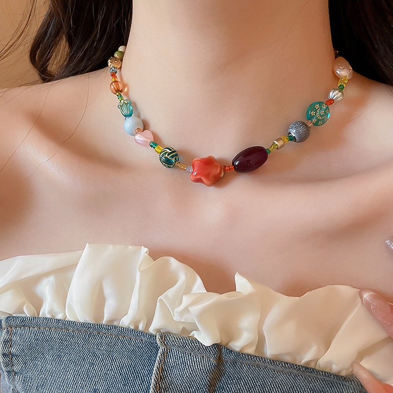 Hạt thủy tinh gốm đầy màu sắc Vòng cổ đính cườm ngôi sao Thiết kế cá tính Nữ khí dây chuyền xương đòn thích hợp dây chuyền cao cấp
