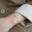 Lắc tay cỏ 4 lá bằng titan không gỉ mạ vàng 18k gắn đá lấp lánh thời trang dành cho nữ