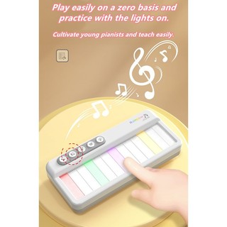Đèn cầu vồng điện tử piano màn hình cảm ứng hộp nhạc giáo dục mầm non nhạc cụ piano nhạc cụ âm nhạc
