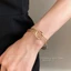Vòng tay mở vàng xoắn không đều Vòng tay ins giác quan tiên tiến trang sức thời trang đơn giản dành cho nữ
