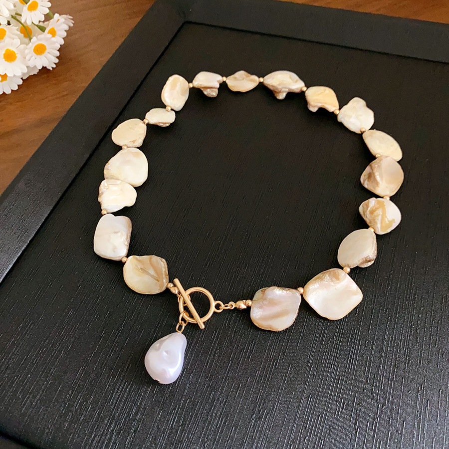 Vỏ không đều sao biển ngọc trai vòng cổ vòng tay bên bờ biển ngày lễ gió xương đòn chuỗi ánh sáng sang trọng cao cấp