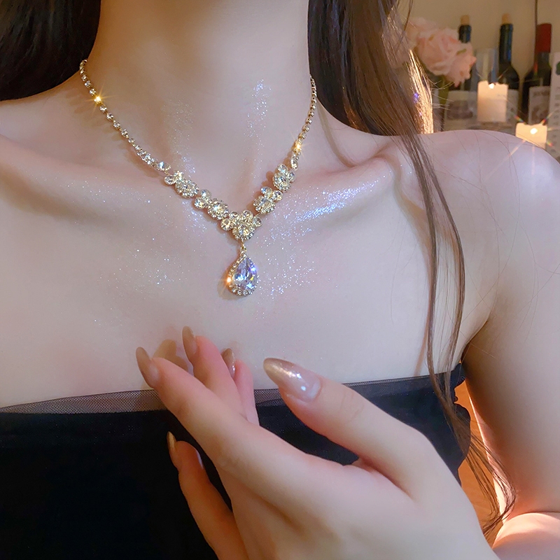 Zircon flash kim cương trang sức bộ váy dạ hội sinh nhật cô dâu tiên tiến cảm giác nhẹ nhàng sang trọng cá tính bông tai xương đòn chuỗi nữ