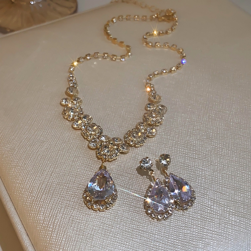 Zircon flash kim cương trang sức bộ váy dạ hội sinh nhật cô dâu tiên tiến cảm giác nhẹ nhàng sang trọng cá tính bông tai xương đòn chuỗi nữ