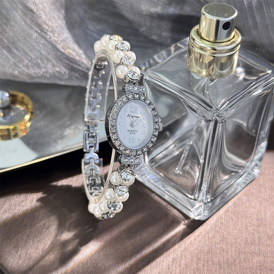 Đồng Hồ Nữ Hàng Đôi Ngọc Trai Tinh Tế Bộ Kim Cương Hình Bầu Dục Vòng Tay Đồng Hồ Vintage Ánh Sáng Sang Trọng Đồng Hồ Thạch Anh Nữ