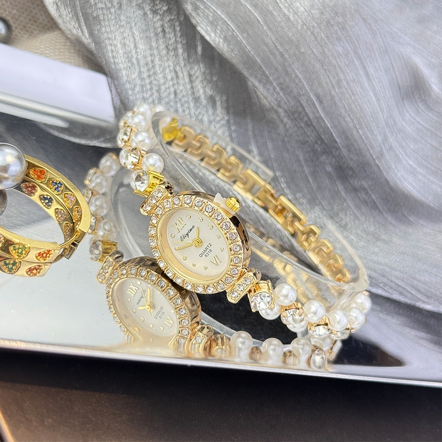 Đồng Hồ Nữ Hàng Đôi Ngọc Trai Tinh Tế Bộ Kim Cương Hình Bầu Dục Vòng Tay Đồng Hồ Vintage Ánh Sáng Sang Trọng Đồng Hồ Thạch Anh Nữ
