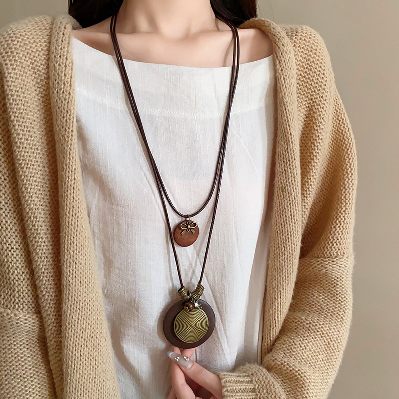 Vòng cổ mặt dây chuyền dân tộc cá tính với lông vũ và hình ngôi sao, thiết kế retro độc đáo