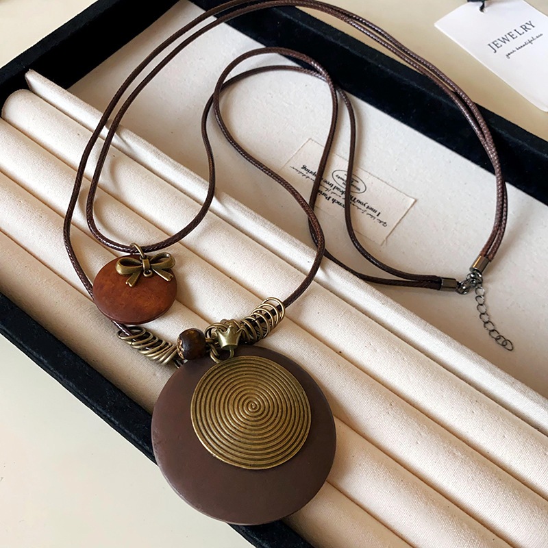 Vòng cổ mặt dây chuyền dân tộc cá tính với lông vũ và hình ngôi sao, thiết kế retro độc đáo