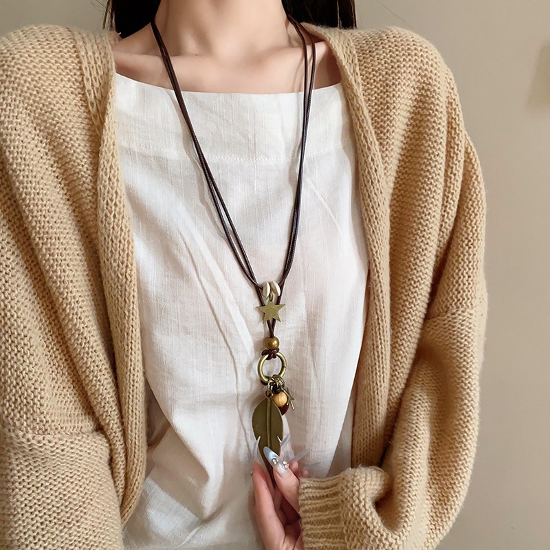 Vòng cổ mặt dây chuyền dân tộc cá tính với lông vũ và hình ngôi sao, thiết kế retro độc đáo