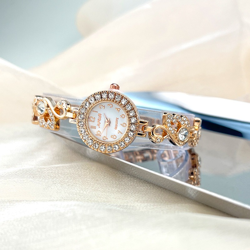 Đồng hồ nữ Bộ kim cương Swan Swarovski Vòng tay Đồng hồ đeo tay nữ Mặt số nhỏ Đồng hồ thạch anh đơn giản