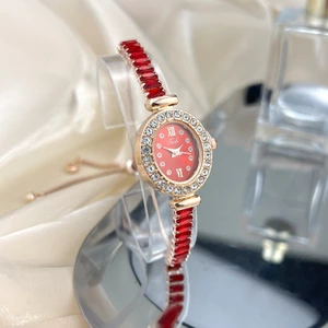 Đồng hồ nữ Vòng tay có thể điều chỉnh miễn phí Đồng hồ nữ Bộ kim cương hình elip Màu Zircon Cao cấp Đồng hồ thạch anh nhỏ gọn tinh tế