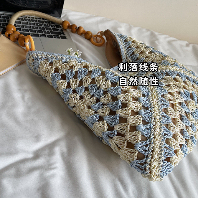 Túi Tote dệt nữ phong cách mới Túi đeo chéo một vai rỗng dung tích lớn