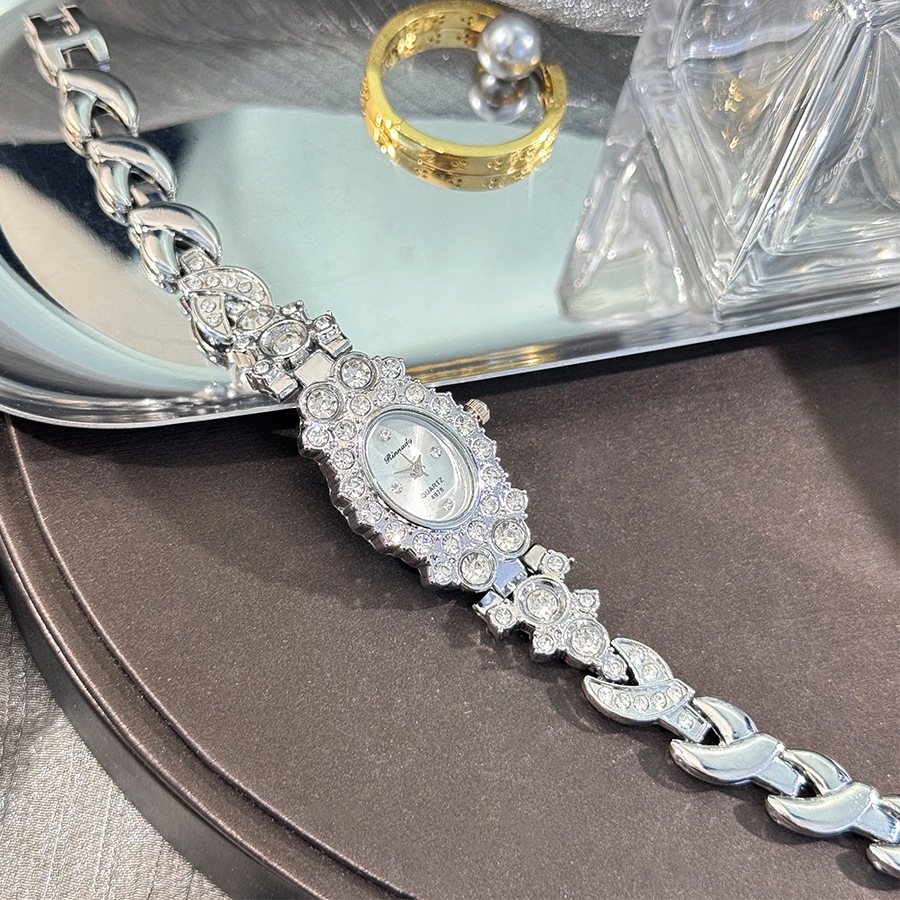 Đồng hồ nữ Pháp dát kim cương thời trang tinh tế Đồng hồ đeo tay nữ hình bầu dục Đồng hồ thạch anh