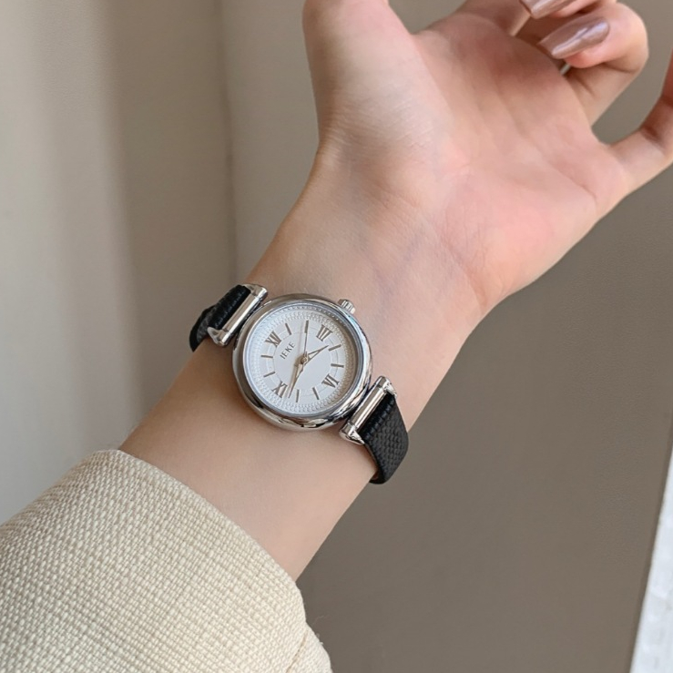 Ieke ánh sáng cổ sang trọng đồng hồ mới cao cấp 100 im lặng thiểu số La Mã tròn đồng hồ nữ thạch anh