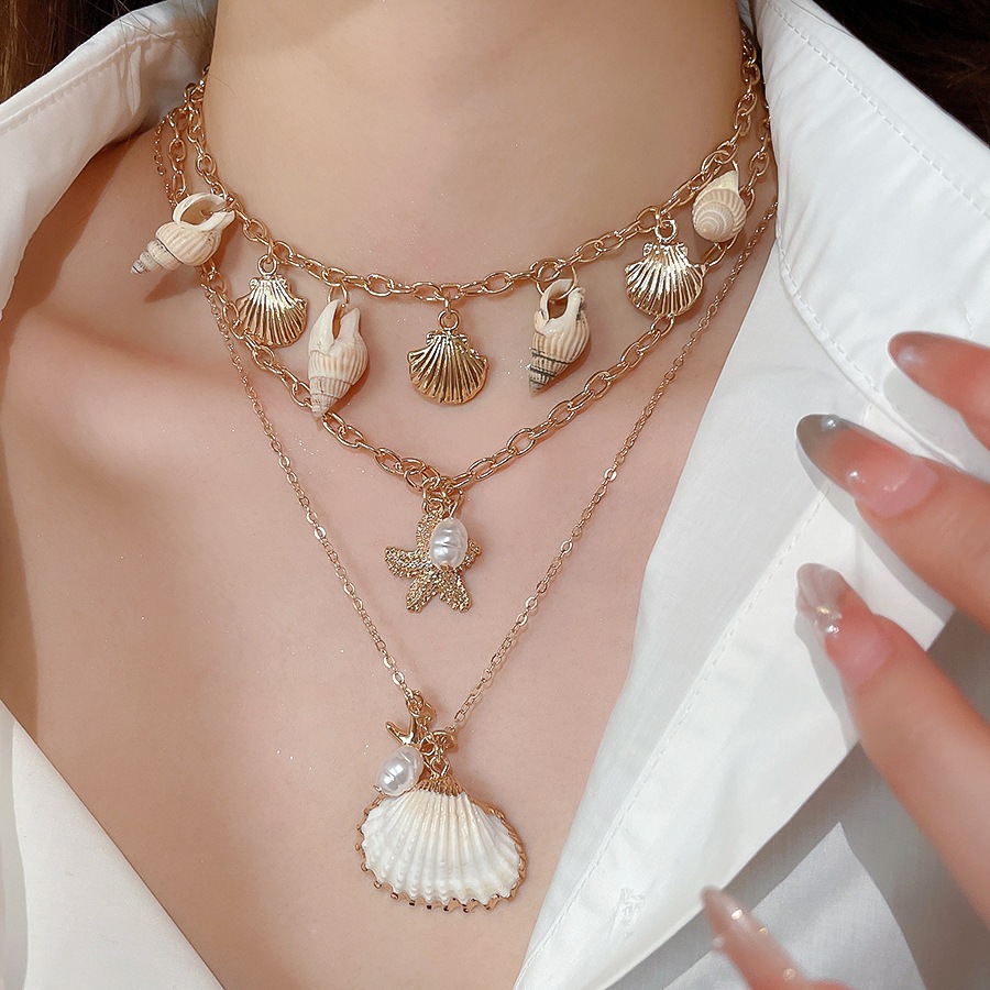 [Jewbeauty] Phong cách kỳ nghỉ bên bờ biển vỏ sao biển ốc xà cừ tua rua nhiều lớp vòng cổ thiết kế chuỗi xương đòn vòng cổ nữ