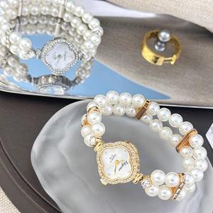 Đồng Hồ Nữ Ngọc Trai Pháp Đính Kim Cương Đồng Hồ Nữ Cỏ Ba Lá Ánh Sáng Sang Trọng Kéo Lên Vòng Tay Đồng Hồ Nữ Vòng Tay Đồng Hồ Thạch Anh Nữ