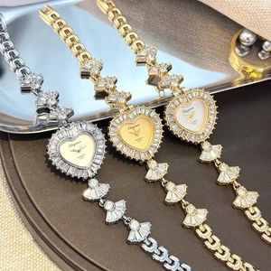 Đồng hồ nữ Bộ tình yêu Zircon Váy nhỏ thời trang Vòng tay tinh tế Đồng hồ thạch anh nữ