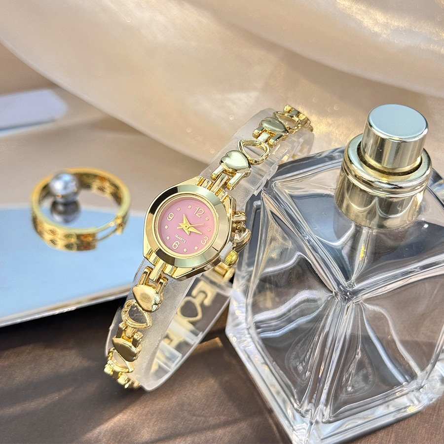 Đồng hồ nữ Mặt dây chuyền trái tim rỗng Vòng tay Đồng hồ thạch anh Đồng hồ trang sức thời trang nhỏ gọn và tinh tế Đồng hồ thạch anh nữ (Không hộp)