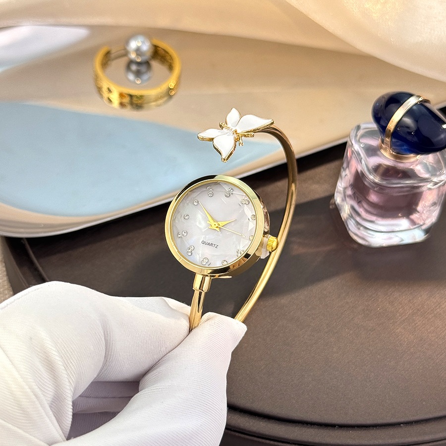 Đồng hồ thạch anh vòng tay nữ thời trang Đồng hồ trang trí hợp kim thép không gỉ phong cách tối giản (Quà tặng cho bé gái)