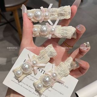 Kẹp tóc nơ ngọc trai kiểu Pháp