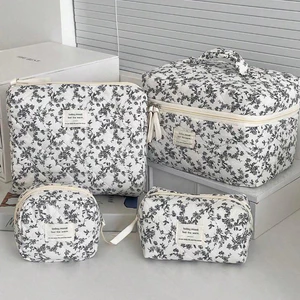 Túi mỹ phẩm Pháp hoa đen trắng vải mềm khóa kéo đơn giản cổ điển nhà ở du lịch nữ