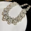 Vòng cổ choker nữ với ngọc trai và kim cương giả màu bạc, phù hợp làm trang sức tiệc cưới theo style vintage glam