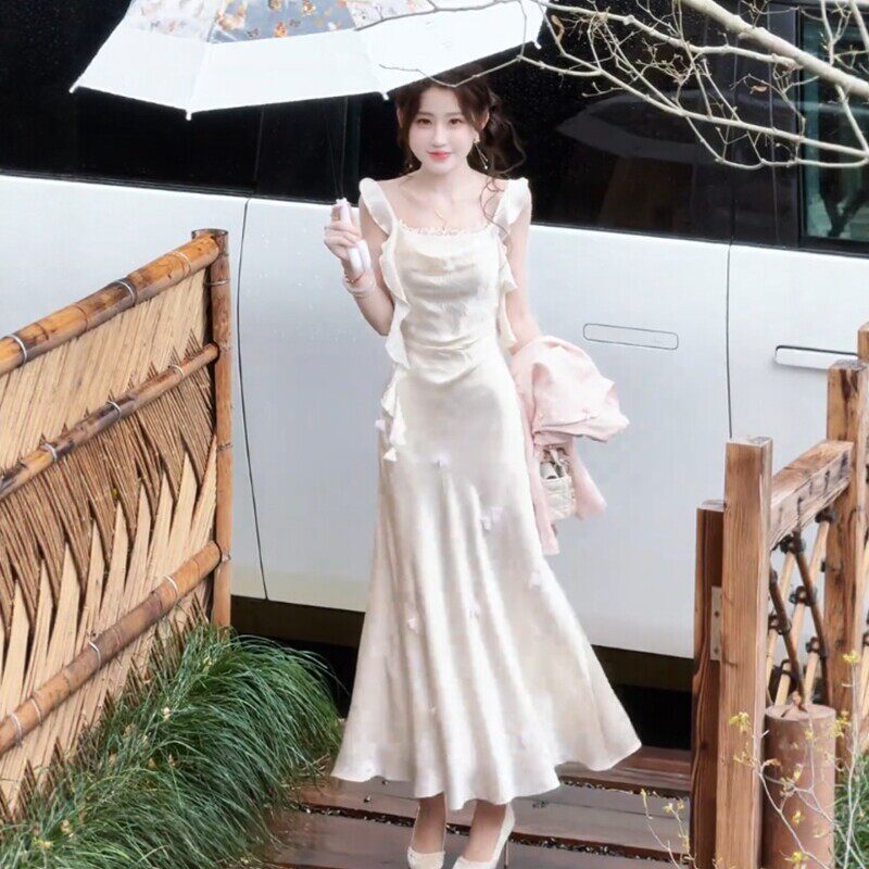 Phiên Bản Hàn Quốc Mùa Hè Phong Cách Mới Màu Be Satin Sling Váy Dài Nữ Mỏng Hơn Nhìn Co Giãn Không Tay Giữa Chiều Dài Chữ A