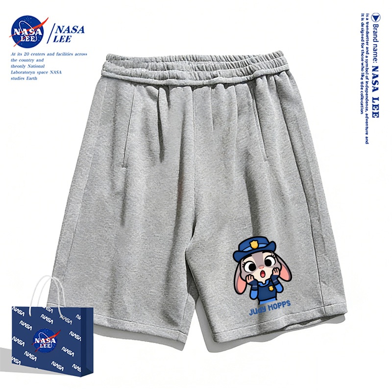Quần short trẻ em NASA màu trắng, họa tiết Judy, phong cách thoải mái, mùa hè 2026, dễ phối đồ cho bé trai và bé gái.