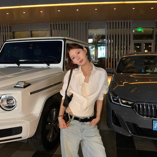 Áo sơ mi nữ màu trắng chất liệu Tencel, dáng ôm body phù hợp mùa xuân, thiết kế cổ polo