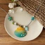 Vòng cổ gradient seashell đính hạt sao biển, ngọc trai acrylic, phù hợpwear cho bãi biển và thời trang đại dương