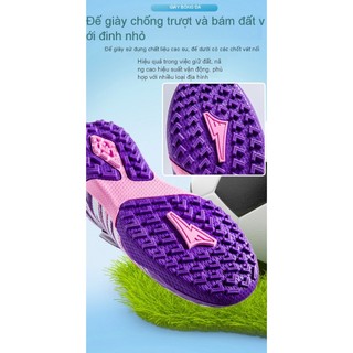Giày bóng đá trẻ em chất lượng cao, phù hợp cho sân cỏ với khả năng chống trượt và chống mài mòn.