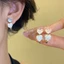 Kẹp tai hình trái tim thủy tinh trong suốt, dễ thương cho nữ, không gây kích ứng