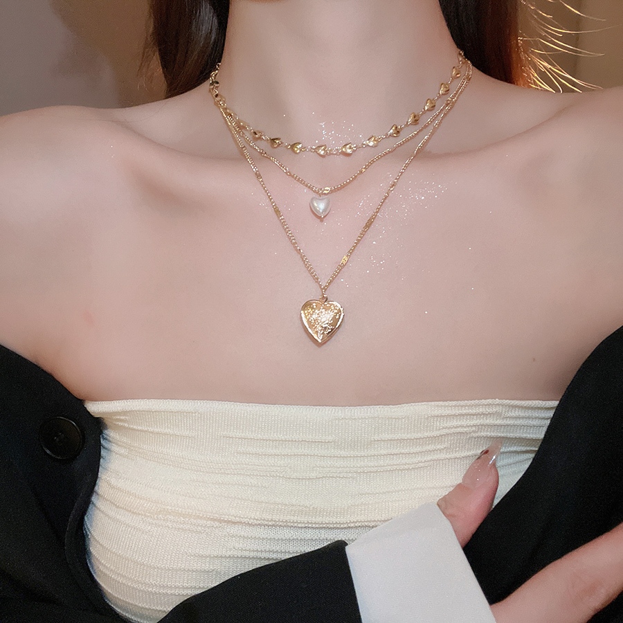 Mặt dây chuyền hình trái tim và vòng cổ ngọc trai ba lớp - Thời trang cá nhân, sang trọng cao cấp