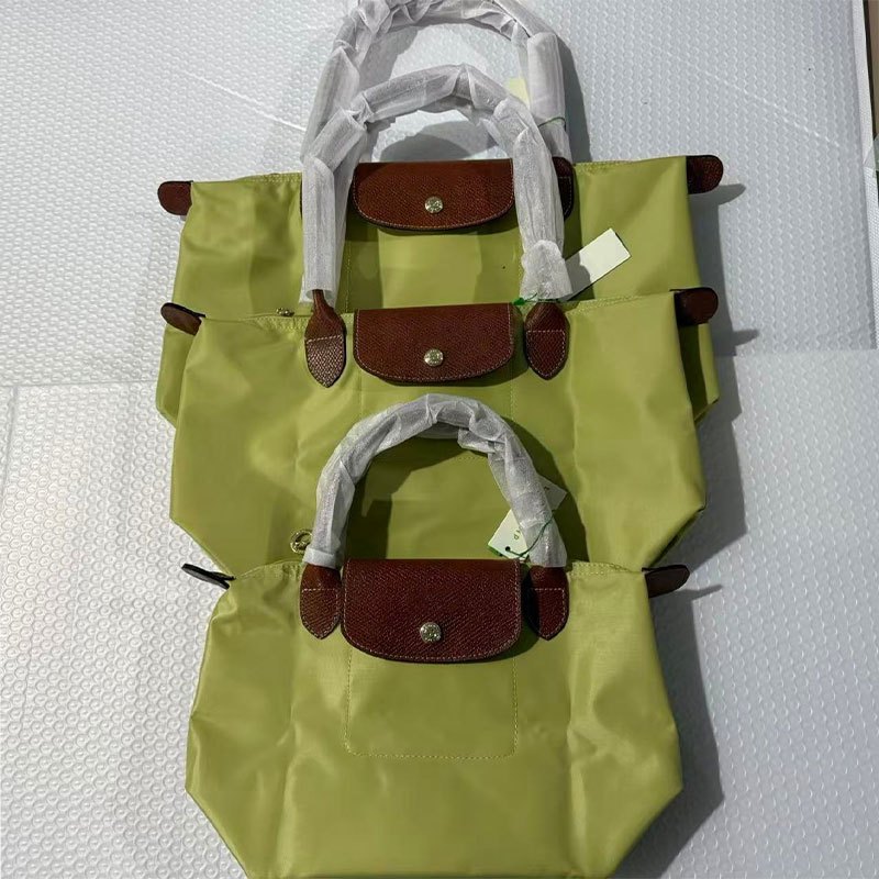 War Horse Tay cầm bằng da nữ mới Túi xách đeo vai đơn Túi du lịch Nylon chống thấm nước
