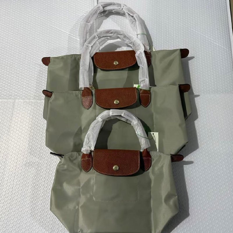 War Horse Tay cầm bằng da nữ mới Túi xách đeo vai đơn Túi du lịch Nylon chống thấm nước